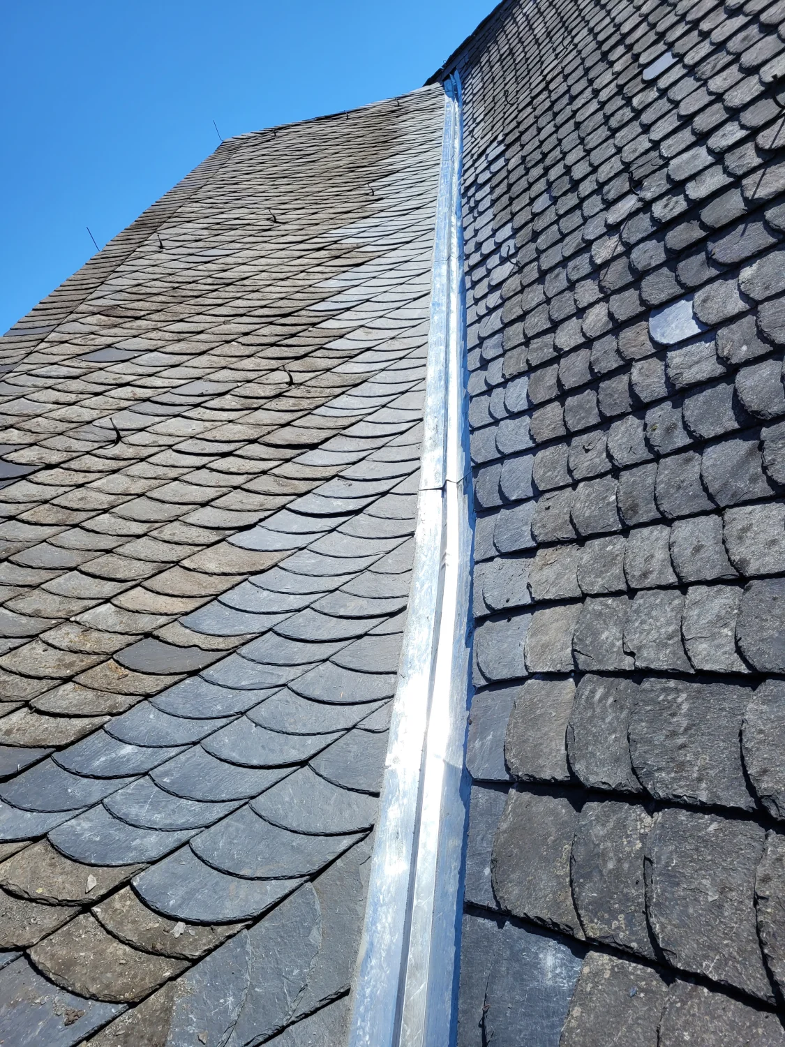 Dachreparaturarbeit der Dachdeckerei Bihler